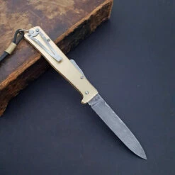 Otter Mercator Brass Damascus With Clip 8 Otter Mercator Brass Damascus With Clip -KNIFE-LOUNGE Sales mercatormessingdamastmitclip