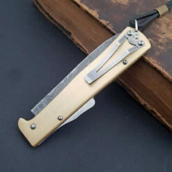 Otter Mercator Brass Damascus With Clip 9 Otter Mercator Brass Damascus With Clip -KNIFE-LOUNGE Sales mercatormessingdamastmitclip2
